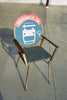 “No-Standing Bus Stop Arm Rester” Chair